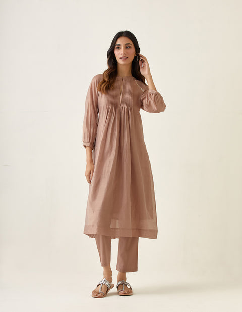 Buy Chanderi Raglan Sleeve Kurta with Pin tuck Details in Taupe, Cotton Pants & Slip (Set of 3) - By Vinusto

