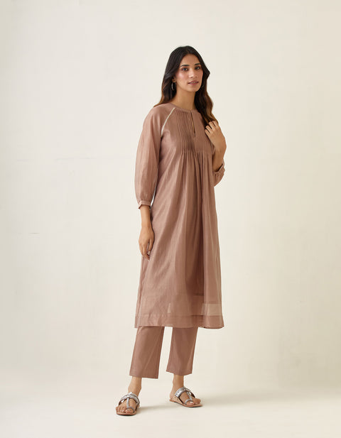Order Chanderi Raglan Sleeve Kurta with Pin tuck Details in Taupe, Cotton Pants & Slip (Set of 3) - By Vinusto
