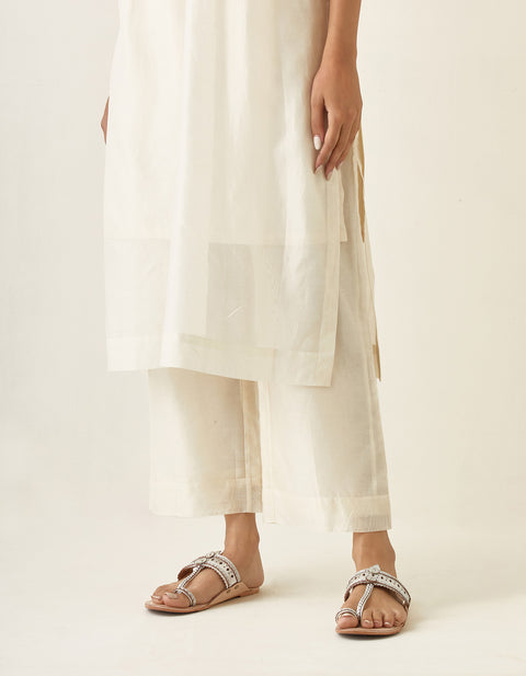 Handcrafted Ivory Pin tuck Embroidered Kurta & Pant set in Chanderi Handloom, with Slip (Set of 3) - By Vinusto