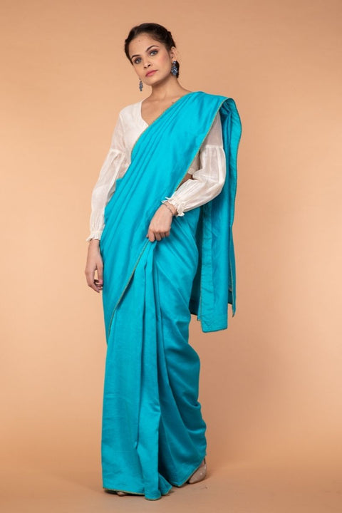 Shop Handcrafted Aqua Chanderi Silk Saree with Gold Lace – Elegant & Timeless

