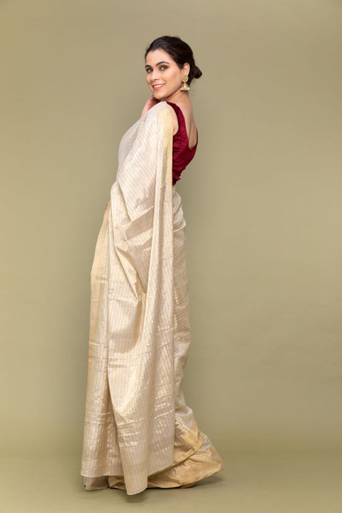 Order Gold & Silver Pinstripe Zari Saree – Handloom Elegance

