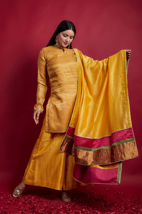 Shop Zigzag Zari Weave Short Kurta with Flared Palazzo in Turmeric Yellow Chanderi Handloom (Set of 2) - By Vinusto
