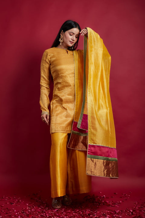 Buy Zigzag Zari Weave Short Kurta with Flared Palazzo in Turmeric Yellow Chanderi Handloom (Set of 2) - By Vinusto
