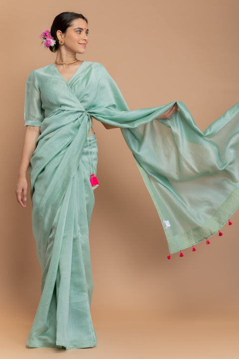 Luxury Chanderi Handloom Saree in Mint Green with Tissue Facing & Pink Tassels

