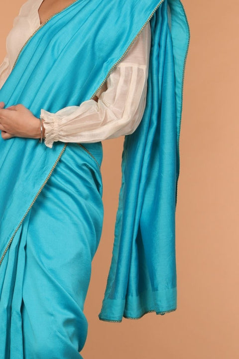 Premium Handcrafted Aqua Chanderi Silk Saree with Gold Lace – Elegant & Timeless

