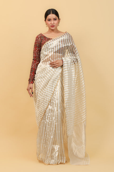Shop White Handwoven Katan Silk Saree with Silver & Gold Stripes – Elegant and Luxurious

