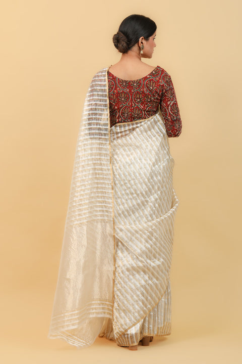 Order White Handwoven Katan Silk Saree with Silver & Gold Stripes – Elegant and Luxurious

