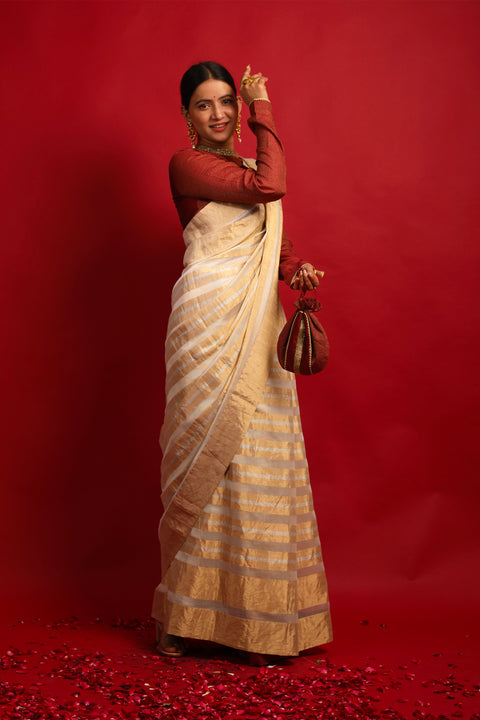 Buy Handcrafted Gold Stripe Ivory Zari Saree – Handloom Elegance

