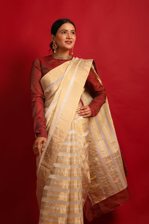 Order Handcrafted Gold Stripe Ivory Zari Saree – Handloom Elegance


